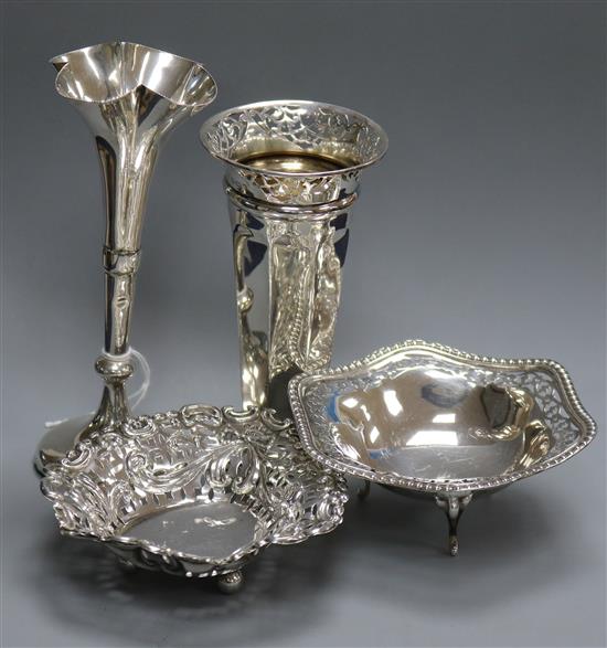 Two silver bonbon dishes and two silver posy vases.